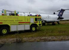 A Fairbanks International Airport fire truck parks near the UAF Community and Technical College 727 aircraft during the state certification test of airport fire rescue personnel on Sept. 19. UAF photo by Kevin Alexander.