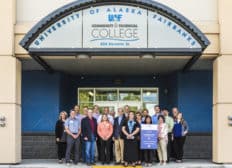 U.S. Secretary of Labor, Alexander Acosta and U.S. Senator, Dan Sullivan pose for a photo with UAF Community & Technical College students, staff, faculty, and community partners in front of CTC's downtown center.